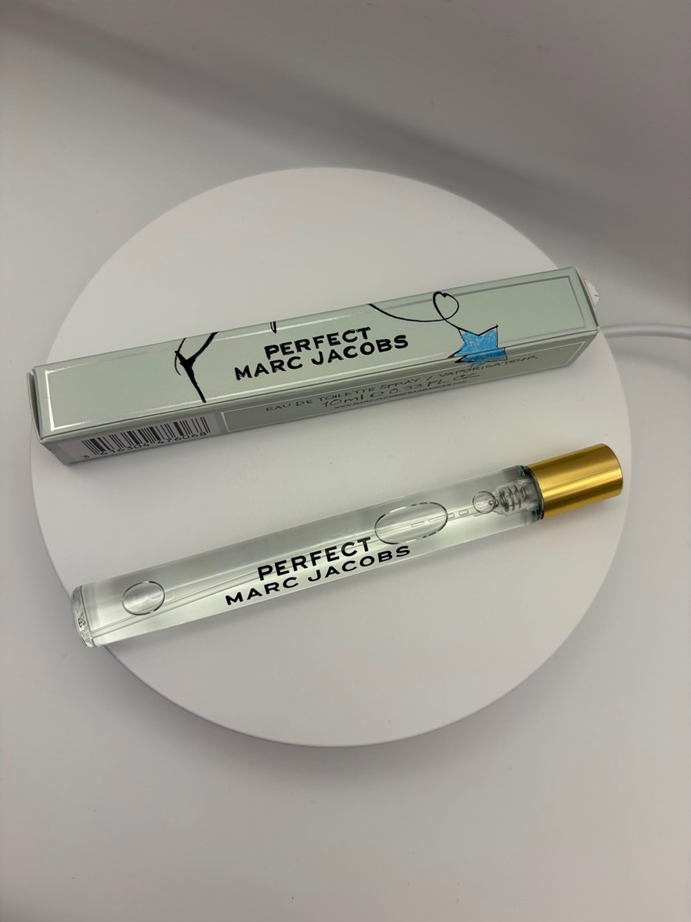 Marc Jacobs Perfect Rollerball in Clear with Gold Cap